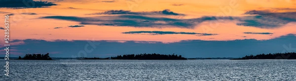 Fototapeta Sunset over several of the 30,000 islands that make up the Georgian Bay archipelago in Ontario, Canada.