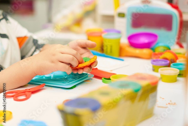 Fototapeta Child play clay toy with learning