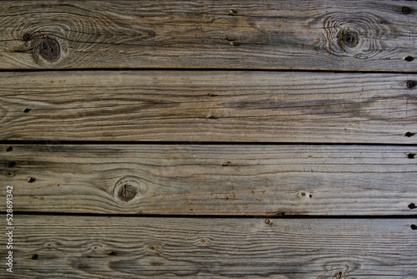 Fototapeta The texture of wood and nails with natural light.