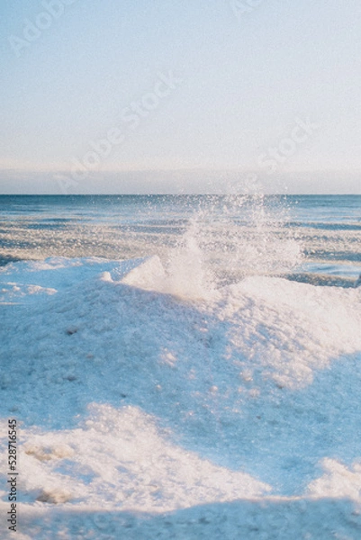 Obraz Ice waves on the beach in winter time