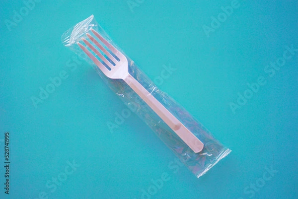 Obraz Plastic spoon and fork on table