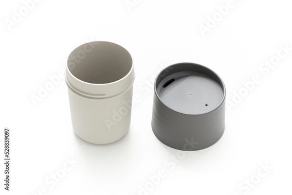 Fototapeta Coffee cup isolated on white background. ฺBeverage container. Product design. Minimalist object. Scandinavian design. Simplicity. Daily use. Household. Plastic material.