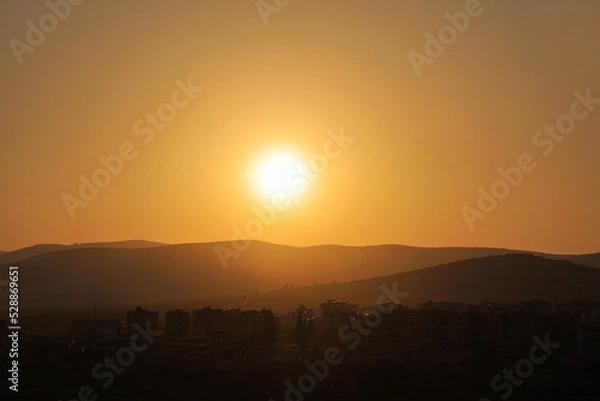 Fototapeta sunset in the mountains