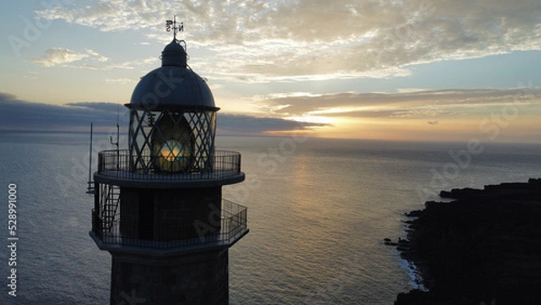 Fototapeta orchilla lighthouse at sunset in El Hierro