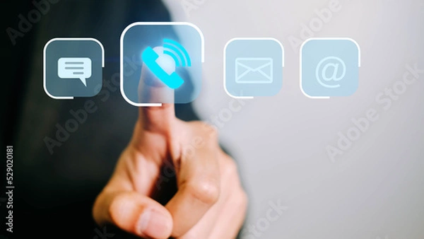 Fototapeta Businessman chooses to press urgent call button For contacting customers, Close-up finger use the urgent telecommunication option for business.