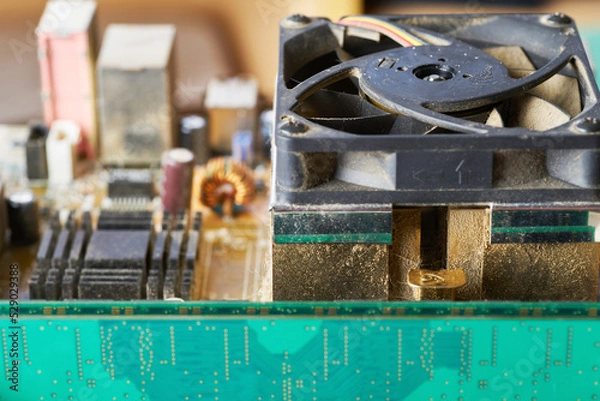 Obraz Old motherboard covered in dust and dirt. Close-up.