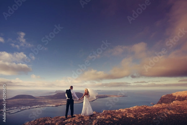 Obraz Newlyweds staring at the horizon in Canary Islands.