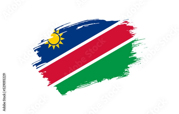 Obraz Creative hand drawn grunge brushed flag of Namibia with solid background