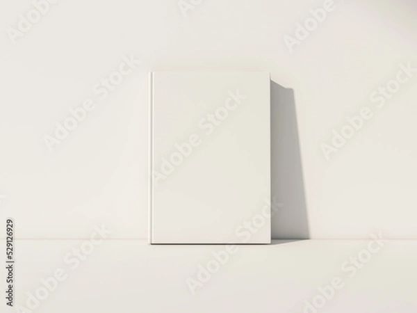 Fototapeta White Book Mockup front view with blank hard cover standing on white table. 3d rendering