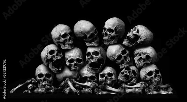 Fototapeta Awesome pile of skull human and bone on wooden, black cloth background, concept of scary crime scene of horror or thriller movies,Halloween theme, Still Life style, selective focus,