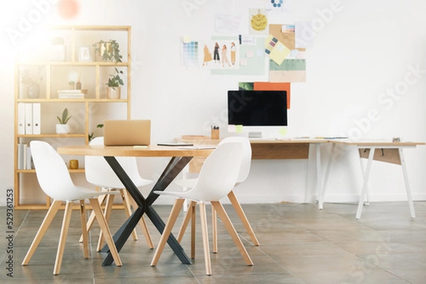 Fototapeta Office interior design, workspace building and desk table with wood chairs. Industrial professional room, concrete floor and white wall paint. Idea style storyboard, modern computer and empty decor