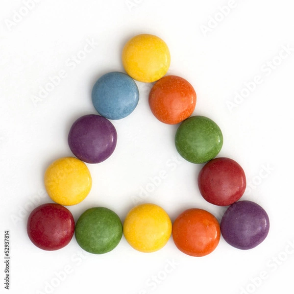 Obraz Colorful smarties in a triangle