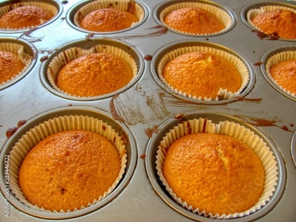 Fototapeta Backblech mit Muffins