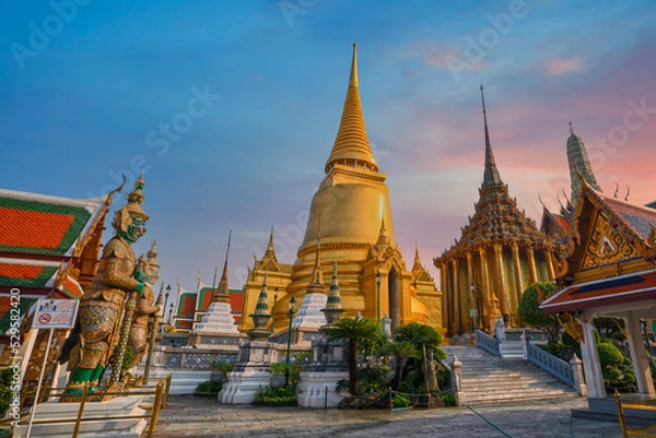 Fototapeta Wat Phra Kaew, Bangkok landmark of Thailand. Temple of the Emerald Buddha at twilight. Landscape of beautiful architecture in Bangkok.