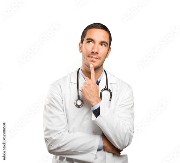 Obraz Doubtful doctor against white background