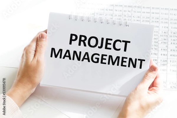 Obraz Notebook with Toolls and Notes about Project Management