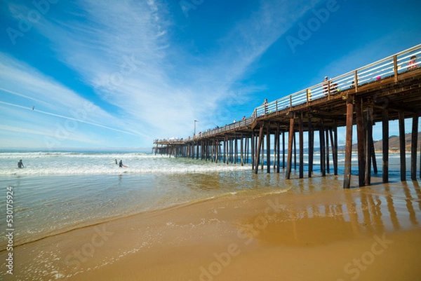 Fototapeta People in Pismo Beach pier on a sunny day