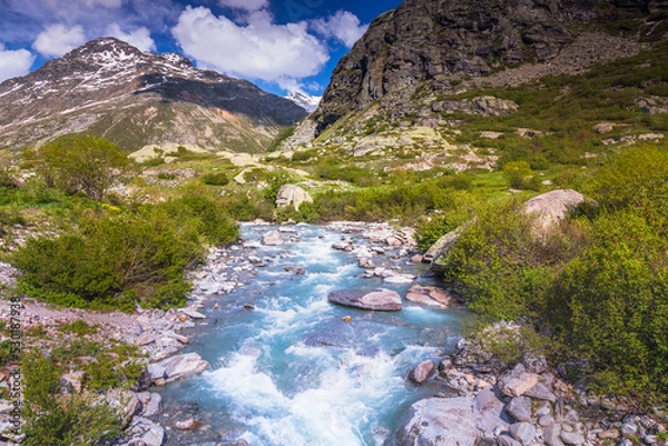 Fototapeta River in idyllic and dramatic landscape of Haute Savoie near Iseran Pass, France