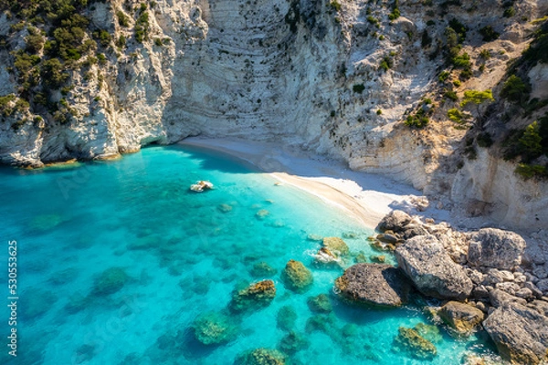 Fototapeta Aerial photo of the paradise beach of Afales in Ithaca, the beautiful  Ionian island of Greece.