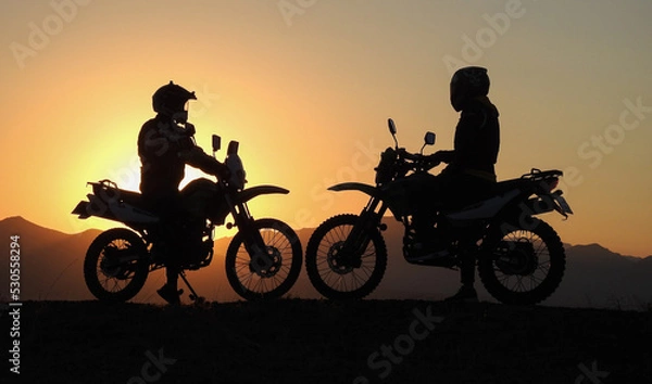 Obraz two motorcycle friends at sunrise