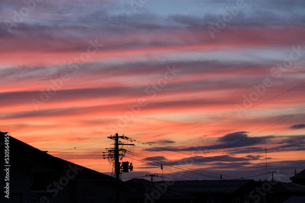 Fototapeta 夕焼け雲と電柱のシルエット