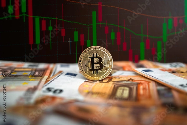 Obraz a golden bitcoin coin, on top of euro bills. Bear market and bull market symbolized by a chart. Crypto currency market.