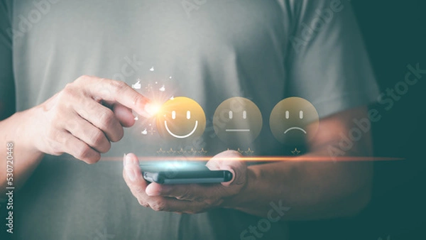 Fototapeta Male consumers rate their satisfaction and rate and review them online. Customer Experience Survey Concepts for Services and Products and Customer Engagement