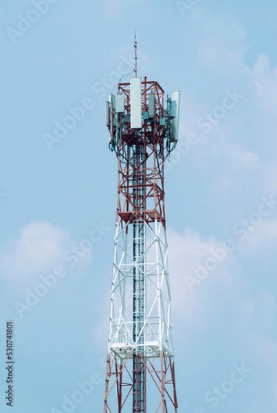 Obraz Telecommunication tower with blue sky background