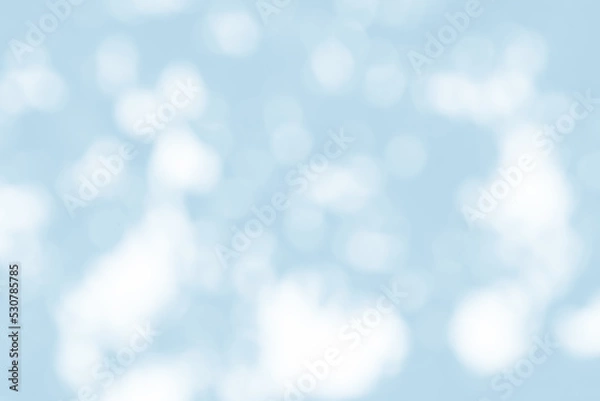 Fototapeta Abstract light blue blur bokeh for background, light blur on high light blue gradient abstract background in central design for presentation.