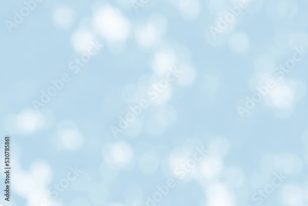 Fototapeta Abstract light blue blur bokeh for background, light blur on high light blue gradient abstract background in central design for presentation.