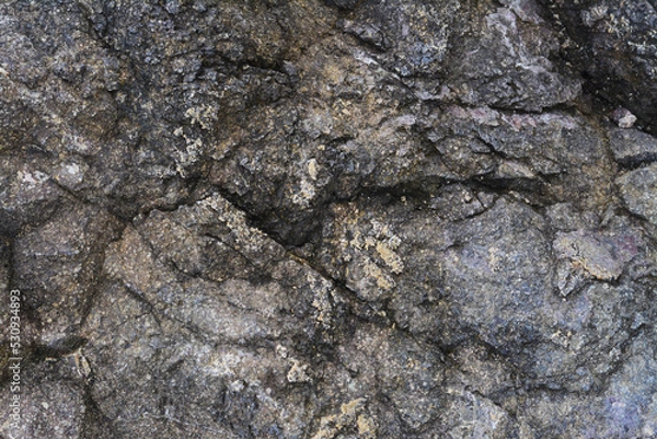 Fototapeta Textured of old stone surface as background, closeup