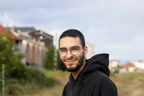 Obraz young man from side looking pleased