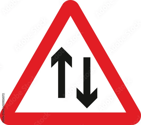 Fototapeta Two-way traffic straight ahead, The Highway Code Traffic Sign, Signs giving orders, Signs with red circles are mostly prohibitive. Plates below signs qualify their message.