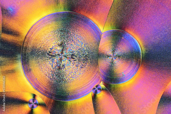 Obraz Colorful micro crystals in polarized light. Photo through a microscope.