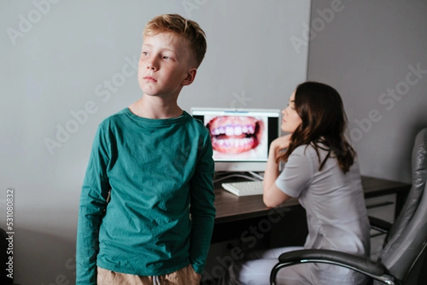 Obraz Young sad boy in dentistry 