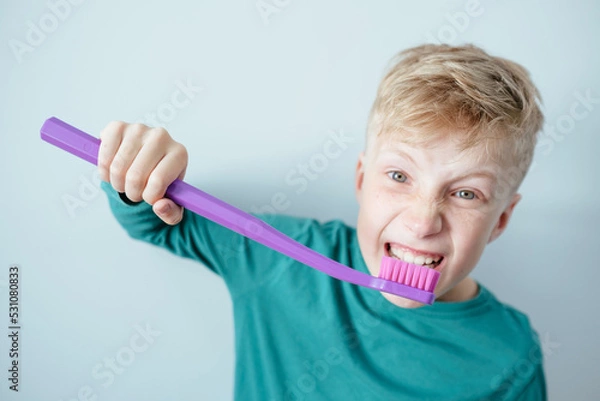 Obraz Smiling boy with toothbrush