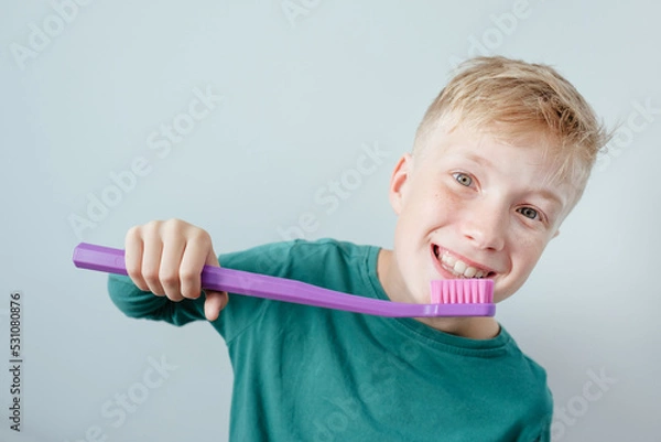 Obraz Smiling boy with toothbrush