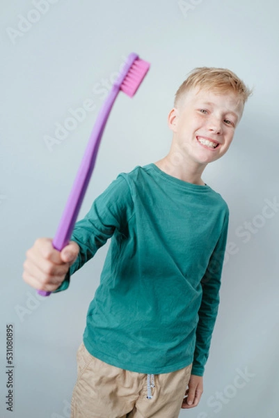 Obraz Smiling boy with toothbrush