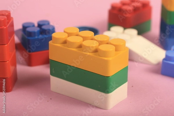 Fototapeta plug-in toys on lilac background