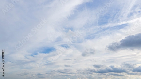 Fototapeta Blue sky and clouds at sunset. Background sky. Nature