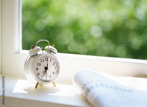 Fototapeta Newspaper and Alarm clock