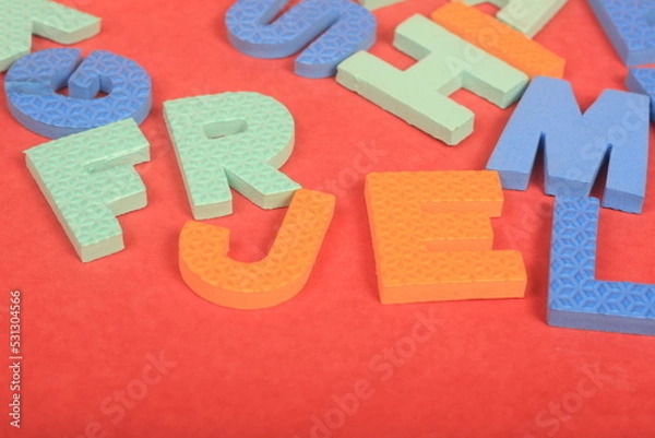 Fototapeta alphabet on red background

