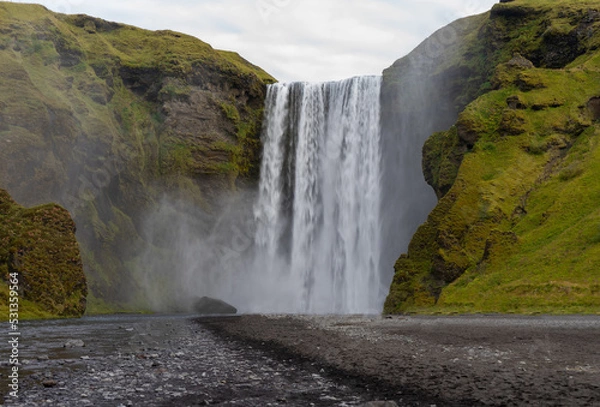 Fototapeta Skógafoss waterfall in the mountains