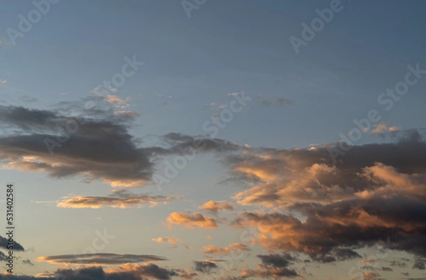 Fototapeta time clouds over sunset