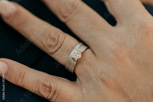 Fototapeta Hand mit Ehering