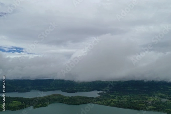 Fototapeta clouds over the mountains