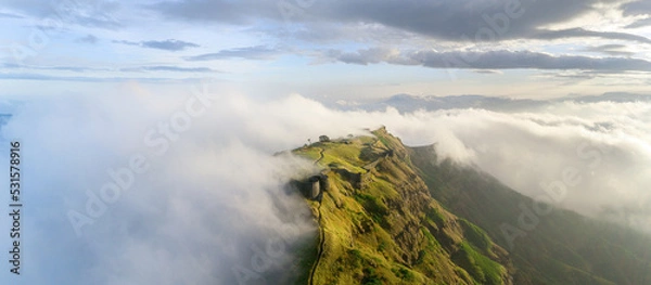 Fototapeta mountain in the clouds