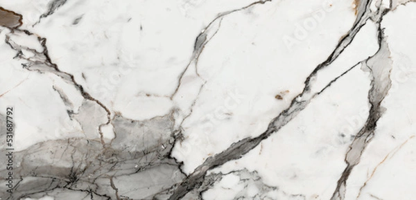 Fototapeta White polished finish italian statuario marble slab with thin streaks, white satvario calacatta panoramic marbling for flooring, wall cladding, ceramic tile, wallpaper, banner, website and print ads.