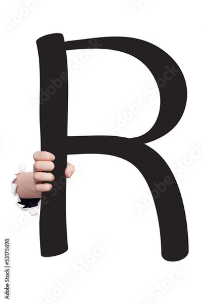 Obraz Hand breaking paper surface holding letter 'R'