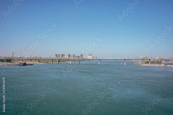 Obraz Novosibirsk. View from the Ob River from the Oktyabrsky Bridge. View of the Railway bridge. Beautiful river.